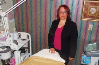Proud new business owner and operator Brenda Repaye at Northern Radiance Aesthetics in Sharbot Lake